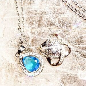 Elegant Silver Necklace with Blue Teardrop Pendant